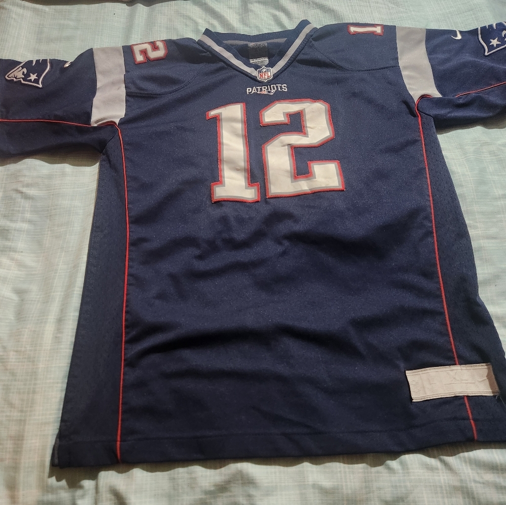 Tom Brady #12 jersey. Navy Blue. Size men’s XL- fits like a women’s medium/large